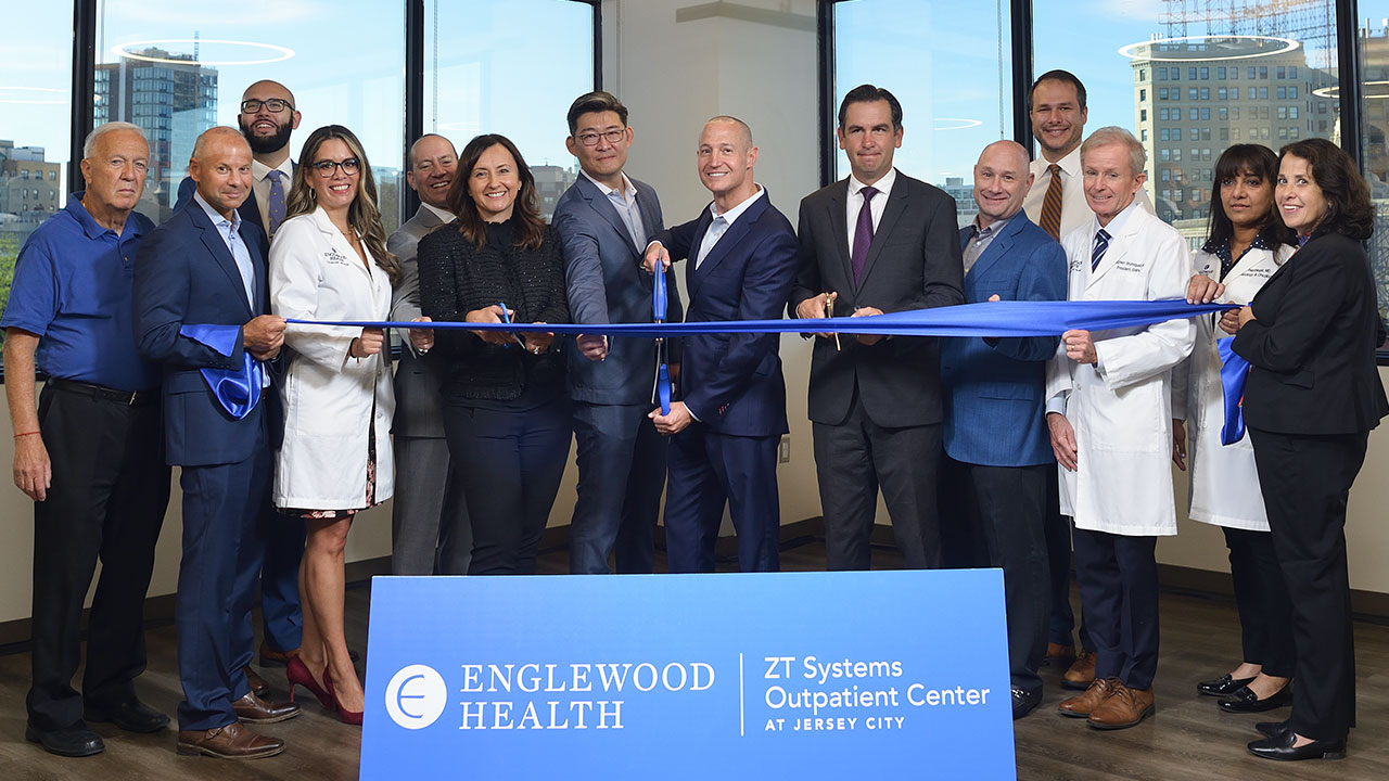 Group photo of ribbon cutting