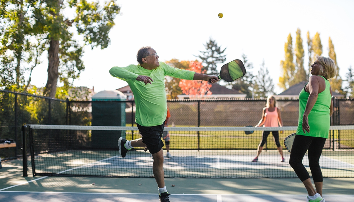 Couple playing pickle ball