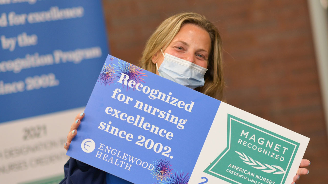 nurse holding sign